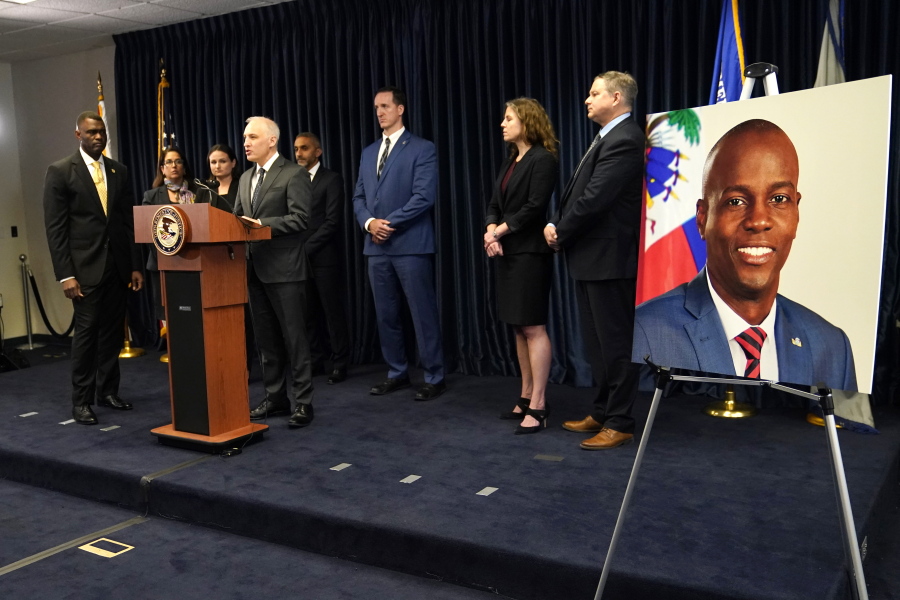 Matthew Olsen, Assistant Attorney General for National Security, speaks during a news conference, Tuesday, Feb. 14, 2023, in Miami. U.S. authorities have arrested four more people in the slaying of Haitian President Jovenel Mo?se, including the owner of a Miami-area security company that hired former soldiers from Colombia for the mission. At left is Markenzy Lapointe, U.S. Attorney for the Southern District of Florida.