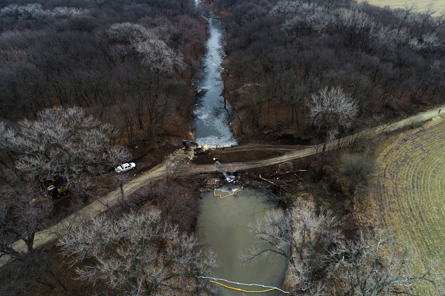 FILE - In this photo taken by a drone, cleanup continues in the area where the ruptured Keystone pipeline dumped oil into a creek in Washington County, Kan., on Dec. 9, 2022. A faulty weld at a bend in an oil pipeline contributed to a spill that dumped nearly 13,000 bathtubs' worth of crude oil into a northeastern Kansas creek, the pipeline's operator said Thursday, Feb. 9, 2023, estimating the cost of cleaning it up at $480 million.