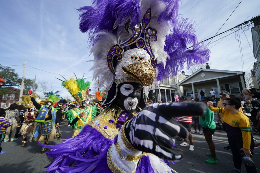 A member of the traditional Mardi Gras group The Trams marches during the Krewe of Zulu Parade on Mardi Gras Day in New Orleans, Tuesday, Feb. 21, 2023.