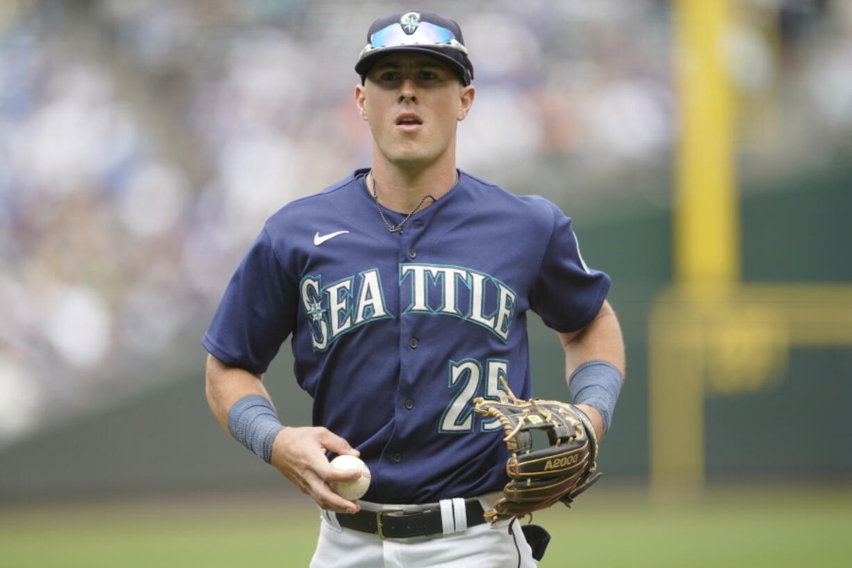 Seattle Mariners shortstop Dylan Moore finalized his three-year contract worth $8,875,000 on Wednesday, Feb. 8, 2023.  (AP Photo/Ted S.