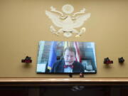 FILE - Food and Drug Administration Commissioner Robert Califf testifies via video during a House Commerce Oversight and Investigations subcommittee hybrid hearing on the nationwide baby formula shortage on Wednesday, May 25, 2022, in Washington. Califf has spent much of his last year on the job warning that growing "distortions and half-truths" surrounding vaccines and other medical products are a major driver of sickness and death in America.