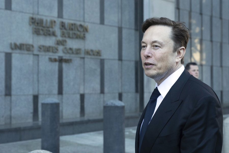 Elon Musk departs the Phillip Burton Federal Building and United States Court House in San Francisco, on Tuesday, Jan. 24, 2023.