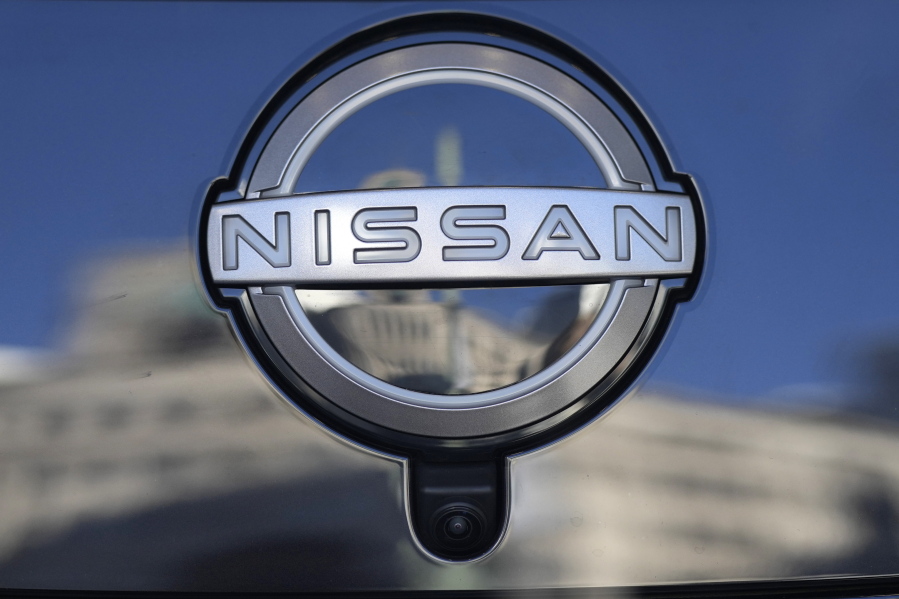FILE - A Nissan logo is seen on a car at its showroom in Tokyo, Feb. 21, 2023. Nissan is recalling more than 809,000 small SUVs in the U.S. and Canada, Tuesday, Feb. 28,  because a key problem can cause the ignition to shut off while they're being driven. The recall covers Rogues from the 2014 through 2020 model years, as well as Rogue Sports from 2017 through 2022.