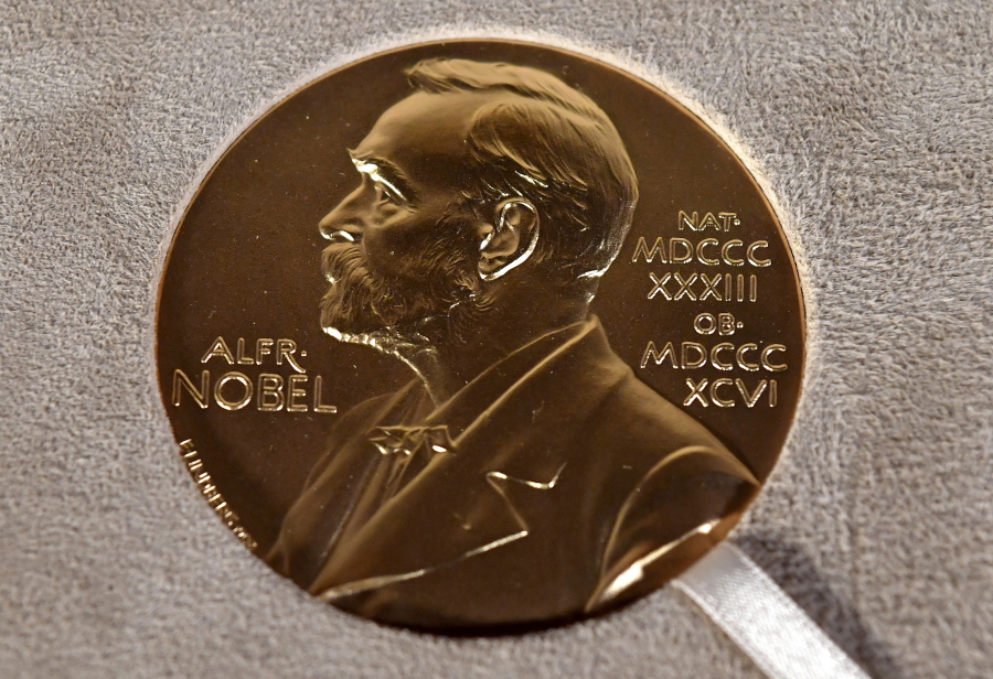 FILE - A Nobel medal is displayed during a ceremony in New York, Tuesday Dec. 8, 2020. The Norwegian Nobel Committee said Wednesday, Feb. 22, 2023, that 305 candidates -- 212 individuals and 93 organizations -- were nominated for the 2023 Nobel Peace Prize by the Feb. 1 deadline.