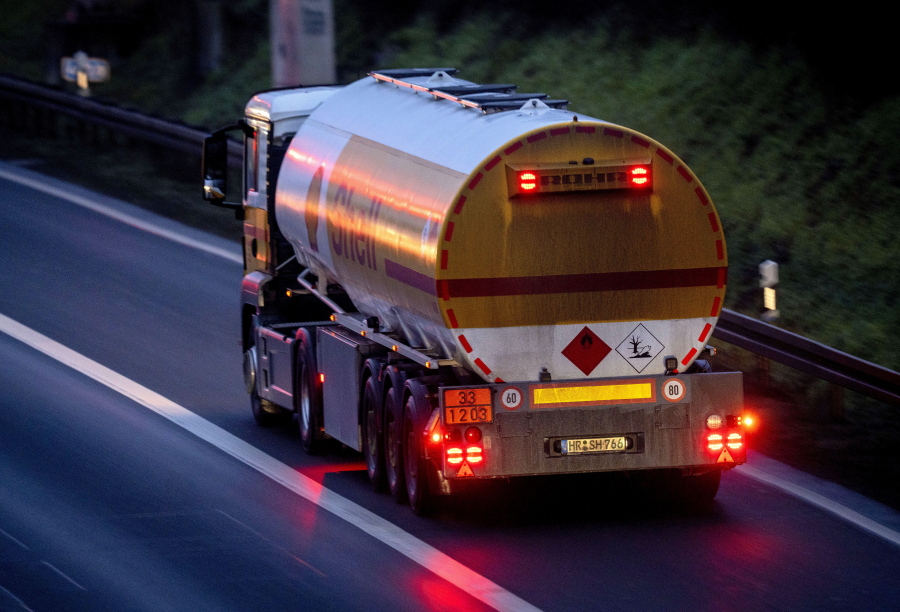 FILE - A fuel trucks drives along a highway in Frankfurt, Germany, Jan. 27, 2023. European Union governments tentatively agreed Friday Feb. 3, 2023, to set a $100-per-barrel price cap on sales of Russian diesel to coincide with an EU embargo on the fuel -- steps aimed at ending the bloc's energy dependence on Russia and limiting the money Moscow makes to fund its war in Ukraine.