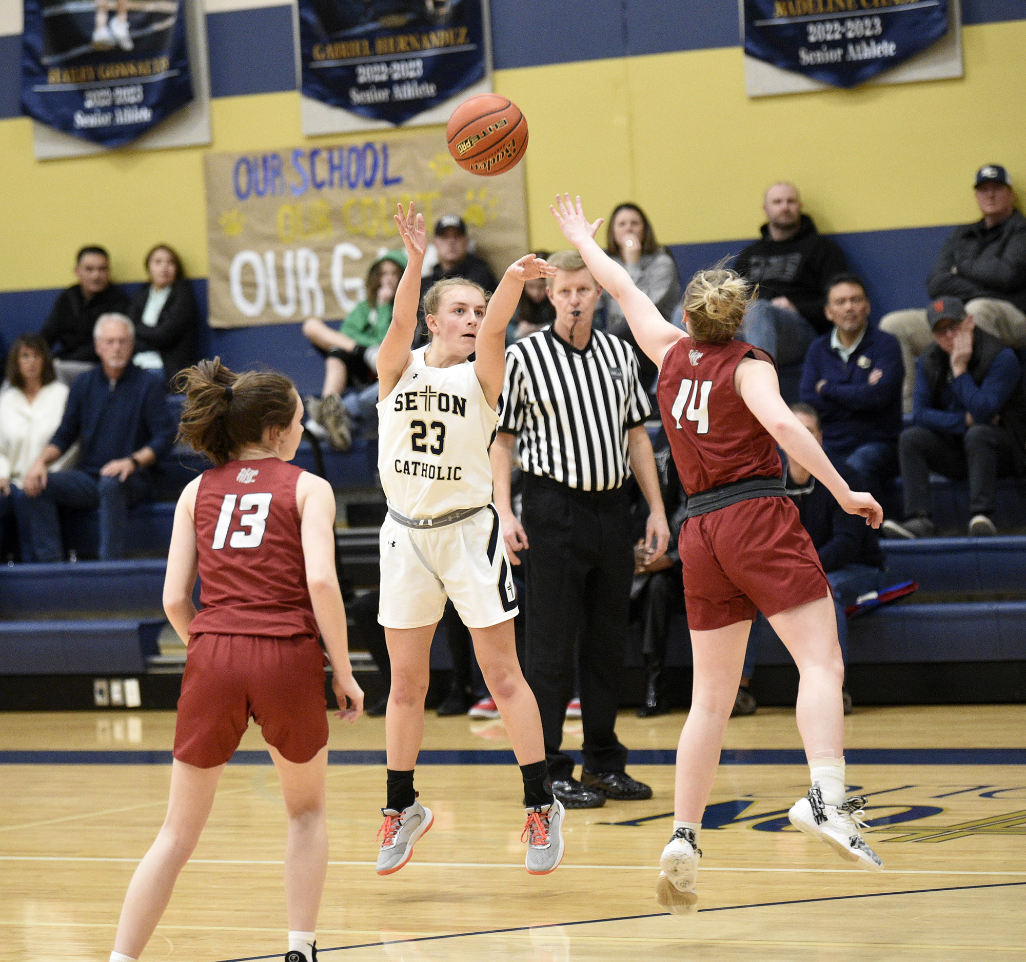 Remy Jenniges of Seton Catholic (23) takes a shot during the Cougars’ 56-45 win over Hoquiam in the 1A district girls basketball semifinal at Seton Catholic High School on Saturday, Feb. 11, 2023.