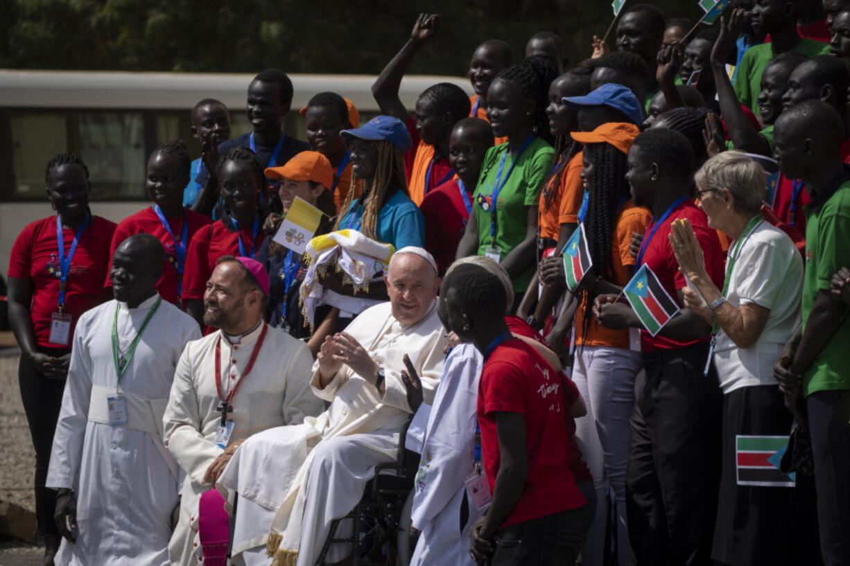 Pope Francis meets with a group of the Catholic faithful from the town of Rumbek, who had walked for more than a week to reach the capital, after he addressed clergy at the St. Theresa Cathedral in Juba, South Sudan Saturday, Feb. 4, 2023.