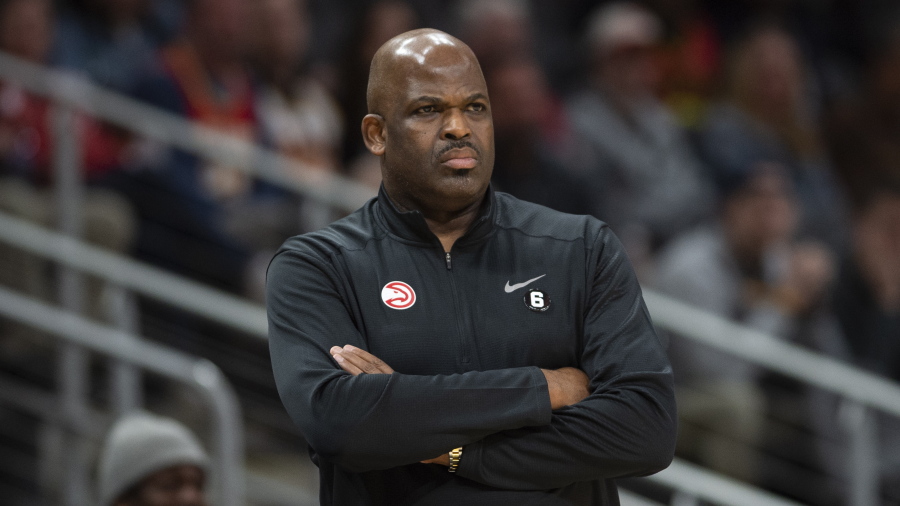 Atlanta Hawks head coach Nate McMillan watches the game from the sideline during the first half of an NBA basketball game against the San Antonio Spurs, Saturday, Feb. 11, 2023, in Atlanta.