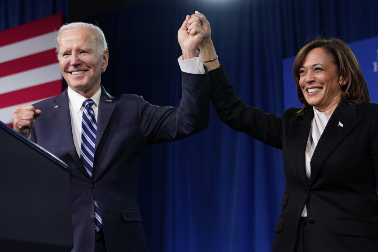 FILE - President Joe Biden and Vice President Kamala Harris stand on stage at the Democratic National Committee winter meeting, Feb. 3, 2023, in Philadelphia. A majority of Democrats now think one term is plenty for Biden, despite his insistence that he plans to seek reelection in 2024.