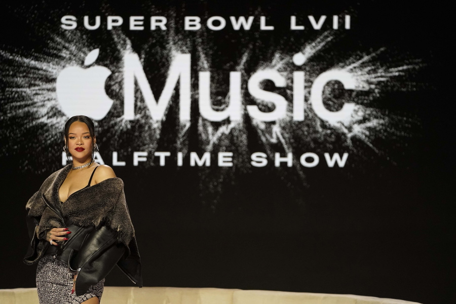 Rihanna poses for a photo after a halftime show news conference ahead of the Super Bowl 57 NFL football game, Thursday, Feb. 9, 2023, in Phoenix.