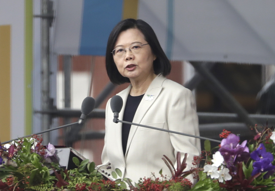 FILE - Taiwanese President Tsai Ing-wen delivers a speech during National Day celebrations in front of the Presidential Building in Taipei, Taiwan, Monday, Oct. 10, 2022. On Thursday, Feb. 2, 2023, President Tsai welcomed the former head of the U.S. Indo-Pacific Command, retired Adm. Phil Davidson, who had warned the island could face an invasion from China this decade, as the mainland ramps up pressure on the self-governing island.
