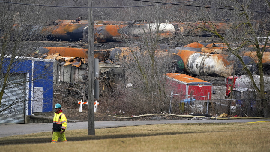 The cleanup of portions of a Norfolk Southern freight train that derailed Friday night in East Palestine, Ohio, continues on Thursday, Feb. 9, 2023. (AP Photo/Gene J.