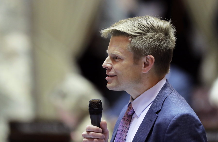FILE - Sen. Jamie Pedersen, D-Seattle, speaks on the Senate floor in Olympia, Wash., Jan. 30, 2019. Evidence of a transgender person's name or gender marker change could soon be hidden from the public record in California and Washington as state lawmakers are considering new privacy provisions amid a barrage of bills targeting trans people nationwide. Maia Xiao, a graduate student wrote last summer to state Sen. Pedersen, the Washington bill sponsor, urging action on behalf of her friend whose name change records had been posted in an online forum and used as ammunition to send her hate mail. (AP Photo/Ted S.
