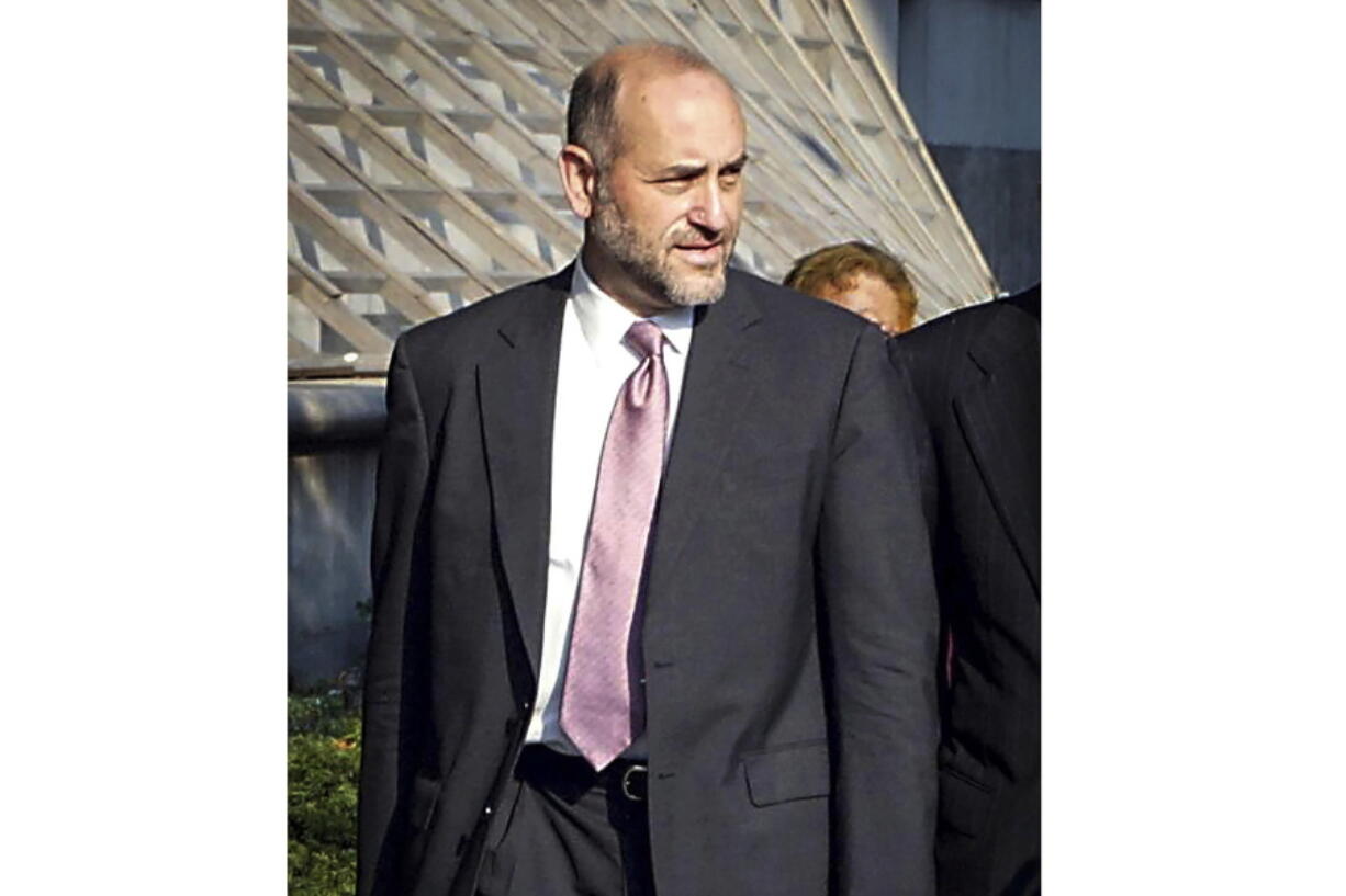 FILE -- Attorney Mark Pomerantz arrives at Federal Court in New York, Aug. 12, 2002. Pomerantz writes in his new book, "People vs. Donald Trump: An Inside Account," that then-District Attorney Cyrus Vance Jr. authorized him in December 2021 to seek Trump's indictment, and laments friction with the new D.A. Alvin Bragg that put that plan on ice.