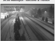 Valentine's Day snow briefly covers Highway 500 near Northeast Thurston Way in this WSDOT traffic cam screen grab downloaded by the National Weather Service in Portland.