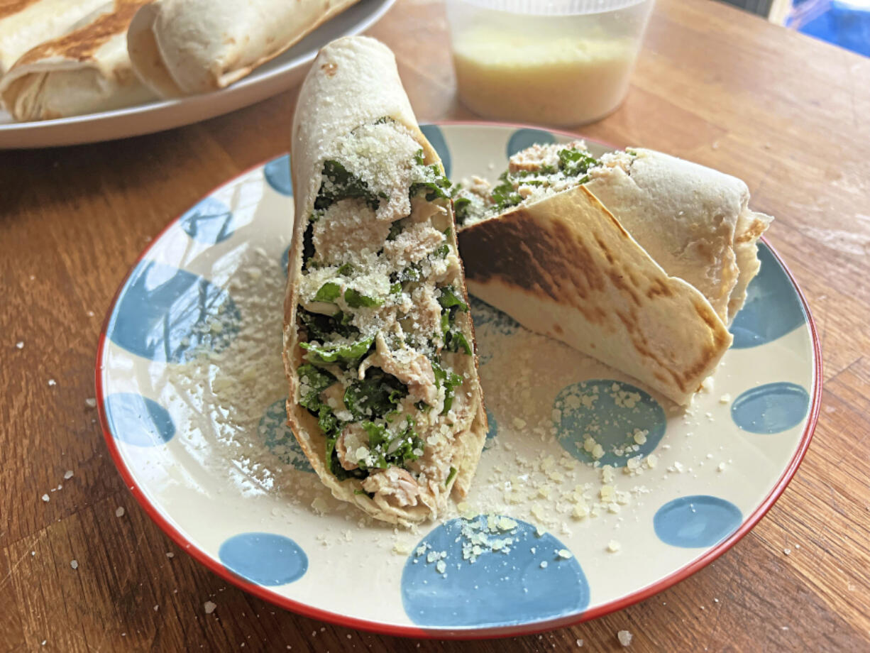 This Lemon Parmesan Chicken Wrap gets a healthy boost with chopped kale in a yogurt dressing.