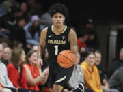 Colorado guard Julian Hammond III scored a career-high 21 points as the Buffaloes beat the Washington Huskies 74-68, on Wednesday, March 8, 2023, in the first round of the Pac-12 Tournament at Las Vegas.