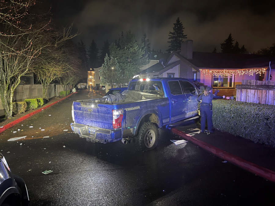 A transient man is accused of crashing a pickup stolen from Vancouver into an occupied Portland police vehicle in southeast Portland. Two officers suffered minor injuries.