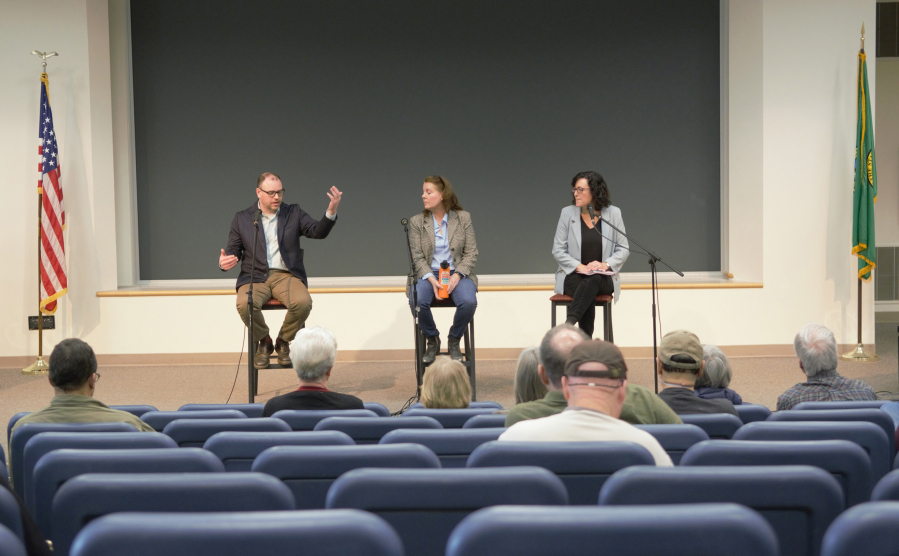 State Sen. Ann Rivers, center, and Reps. Greg Cheney, left, and Stephanie McClintock from the 18th Legislative District engage in conversation Saturday with participants at a town hall at Washington State University Vancouver.