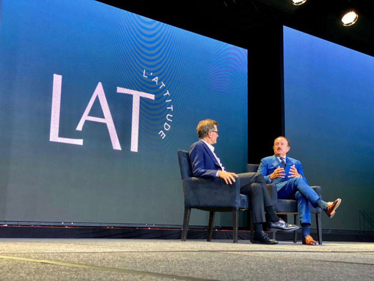 Solomon Trujillo, right, talks with Kevin Reilly of Warner Media at the 2019 L'Attitude conference in San Diego.