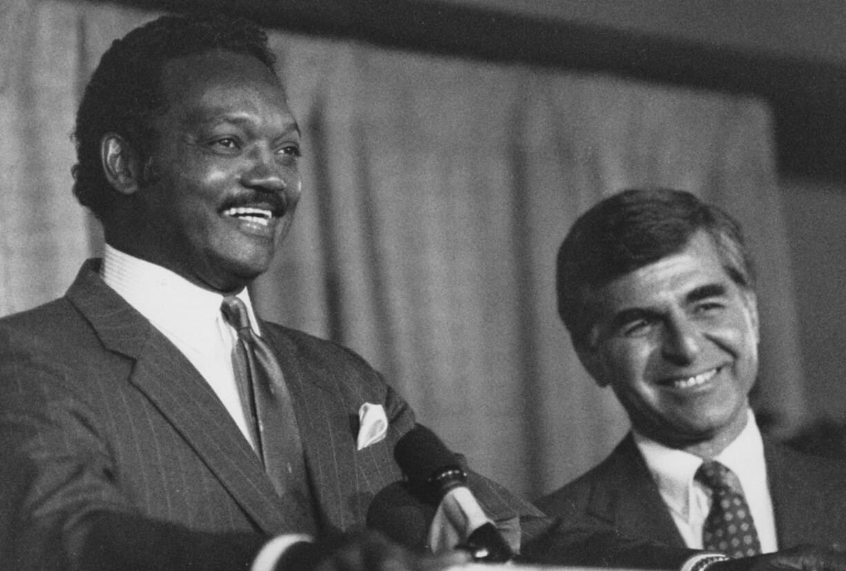 The Rev. Jesse Jackson with nominee Michael Dukakis at the Democratic National Convention on July 18, 1988, in Atlanta.