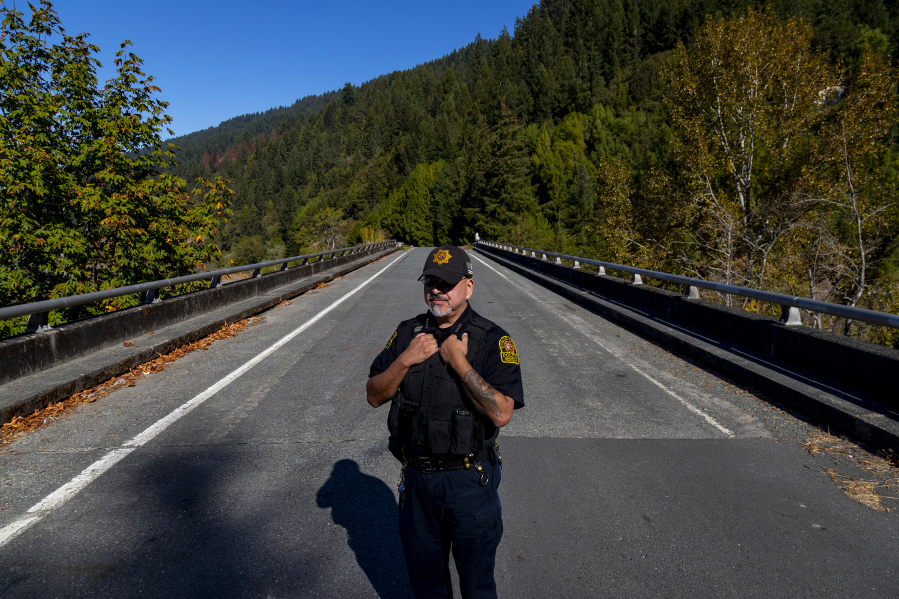 Yurok Tribal Police Chief Greg O'Rourke stands on the bridge on Oct. 5, 2022, in Pecwan, California, where Emmilee Risling was last seen before she disappeared in October of 2021 on a rural Native American reservation in Humboldt County.