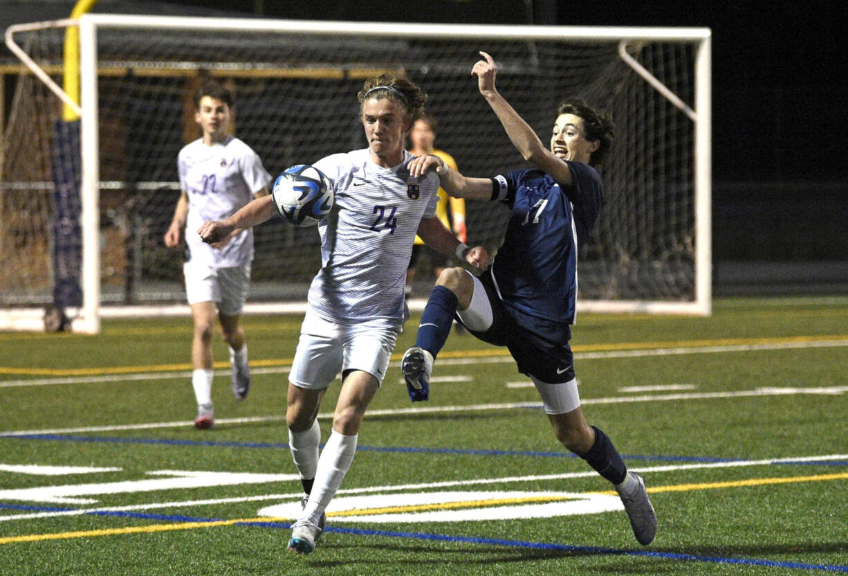 Columbia River’s Tyler Brown, left, and Skyview’s Lucas Witthauer battle for possession of the ball during a non-league boys soccer game on Monday, March 20, 2023, at Kiggins Bowl in Vancouver.