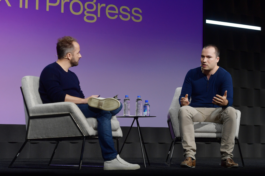 Drew Houston and Greg Brockman speak onstage during the Dropbox Work In Progress Conference at Pier 48 on Sept. 25, 2019, in San Francisco.