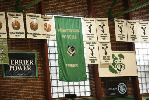 Banners hang in the gymnasium at the Washington School for the Deaf on Tuesday, March 28, 2023. (Tim Martinez/The Columbian)