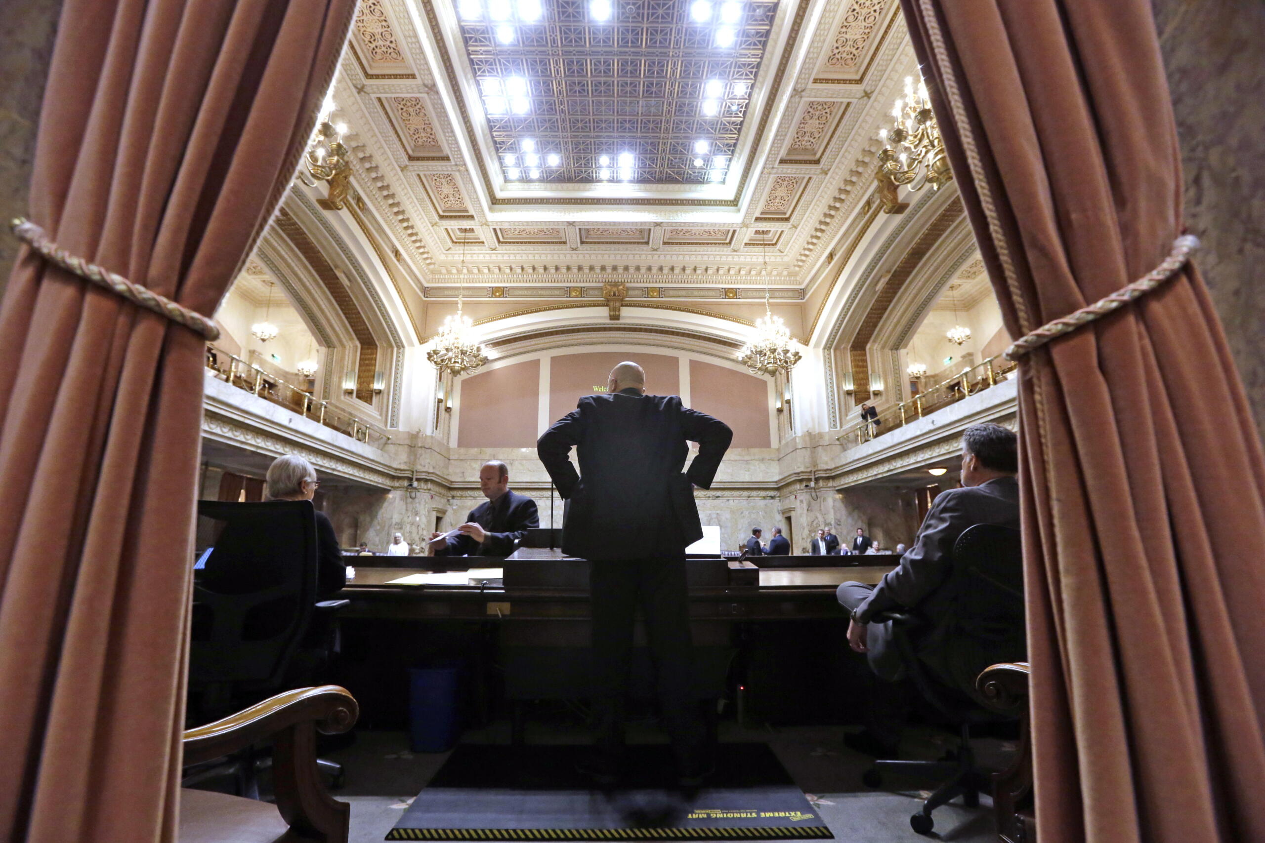 House Speaker Pro Tempore Jim Moeller looks out over the House Chamber moments before the start of a 30-day special session of the Legislature Wednesday, April 29, 2015, in Olympia. Moeller died Wednesday following a years-long battle with Parkinson’s disease.