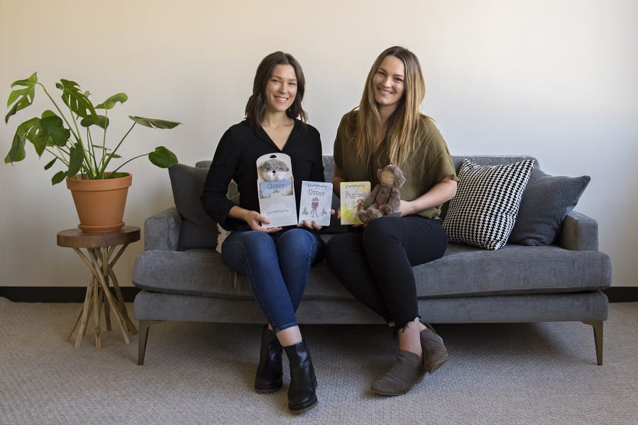 Slumberkins co-founders and CEOs Kelly Oriard, left, and Callie Christensen pause for a portrait at their downtown Vancouver office in December 2020.