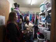 Alaire de Salvo, Janus Youth Programs shelter and outreach director, left, and case manager Robin Miller look over the clothes closet at Oak Bridge Youth Shelter. Oak Bridge, the first crisis intervention shelter of its kind in the Clark County area, serves both state-dependent and non-state-involved youth ages 9 to 17 and their families.