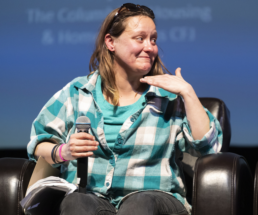 Outpost Safe Stay resident Courtney Ligman chokes up recalling how helpful seeing the same outreach workers was during her time on the street Wednesday during The Columbian Conversations event at the Kiggins Theatre in Vancouver.