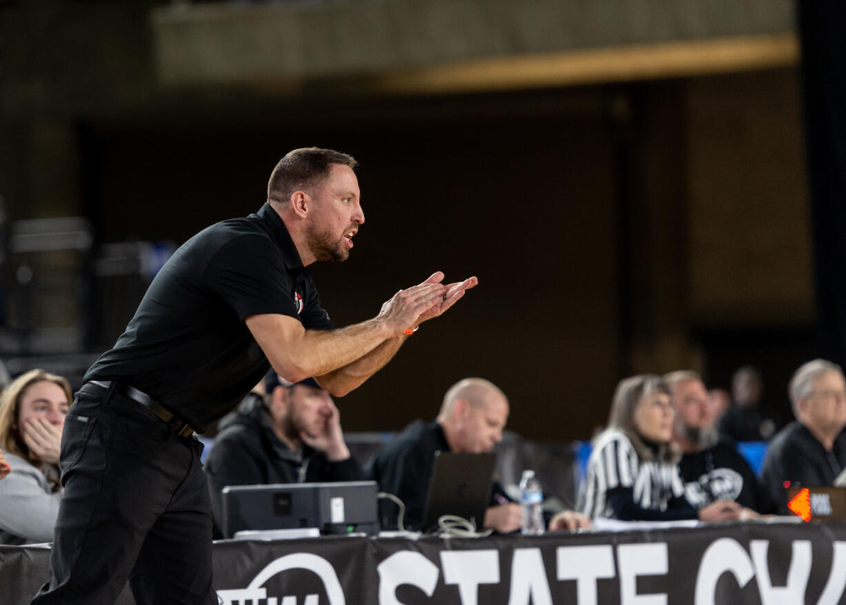 Union coach Blake Conley shouts to his players during a Class 4A State boys basketball game on Wednesday, March 1, 2023, at the Tacoma Dome.