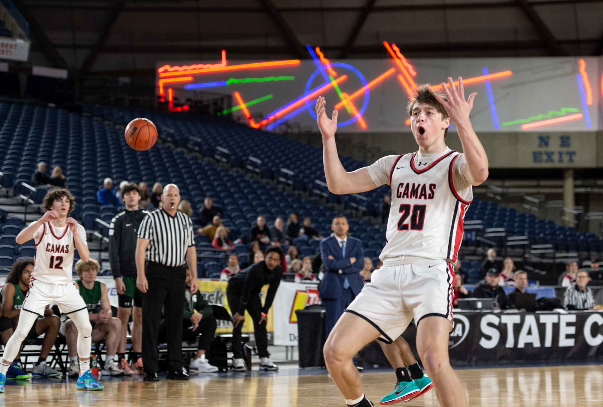 Camas senior guard Theo McMillan reacts to not getting a pass as he cut through the lane during a Class 4A State boys basketball game on Friday, March 3, 2023, at the Tacoma Dome.