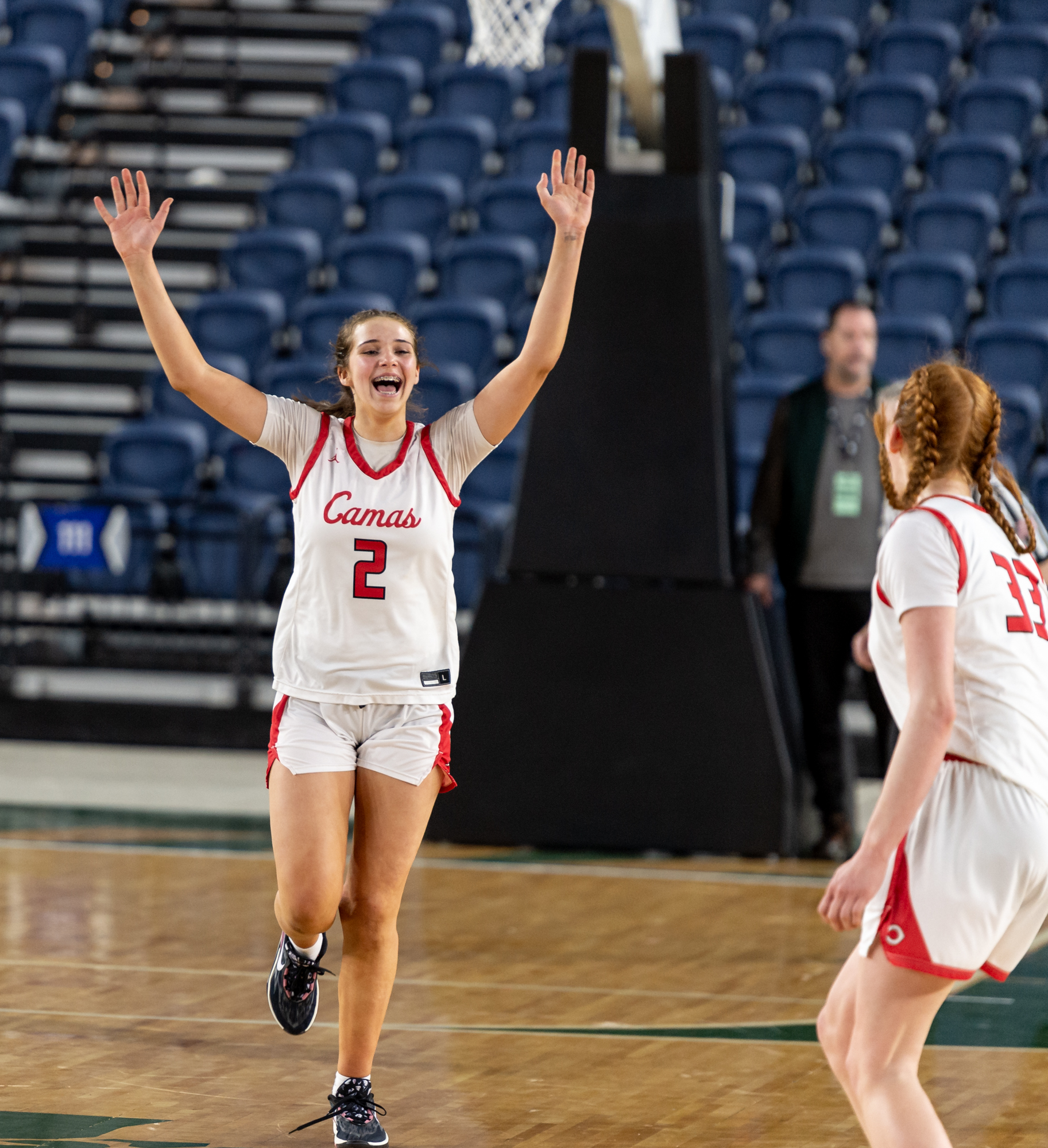 Camas sophomore forward Kendall Mairs celebrates victory during a Class 4A State girls basketball semifinal on Friday, March 3, 2023, at the Tacoma Dome.