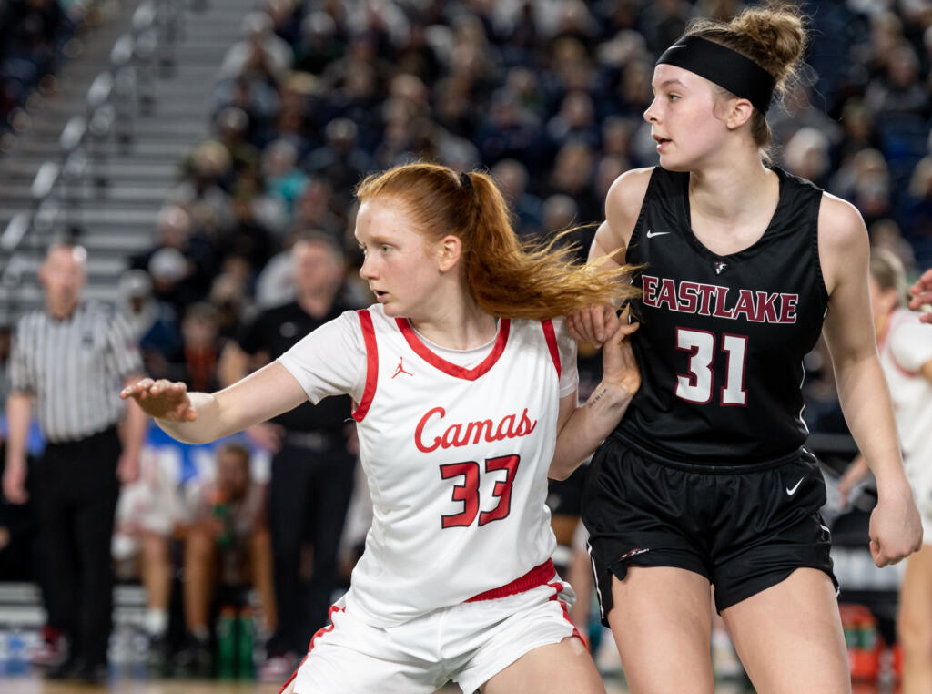 Camas junior forward Addison Harris and Eastlake senior post Ava Schmidt battle for post position during the WIAA Class 4A State Girls Basketball Championship on Saturday, March 4, 2023, at the Tacoma Dome.