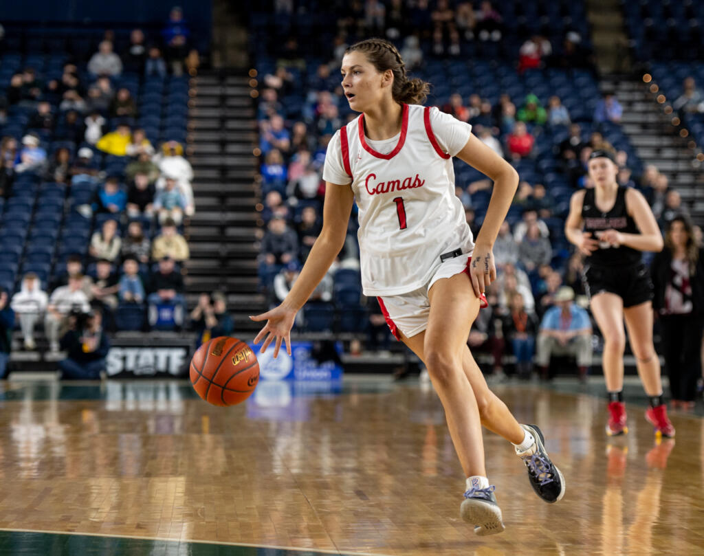 Camas junior forward Reagan Jamison dribbles on a fast break during the WIAA Class 4A State Girls Basketball Championship on Saturday, March 4, 2023, at the Tacoma Dome.