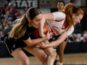 Camas junior forward Addison Harris fights for a rebound during the WIAA Class 4A State Girls Basketball Championship on Saturday, March 4, 2023, at the Tacoma Dome.