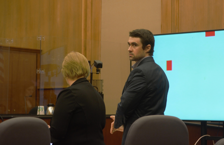 Jacob Cantrell, right, stands next to his defense attorney, Josephine Townsend, during his second-degree attempted murder and first-degree assault trial Tuesday in Clark County Superior Court. Cantrell claims he shot another man in June 2022 in his east Vancouver driveway in self-defense.