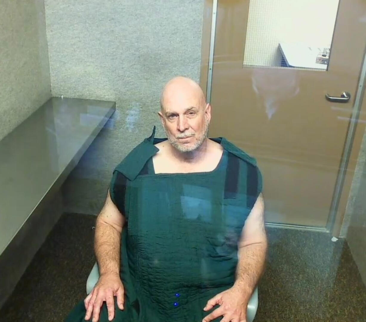 Gregory S. Bailey, 59, appears Friday in Clark County Superior Court on suspicion of vehicular homicide. He's accused of racing and driving drunk in an October crash that killed a Vancouver man.