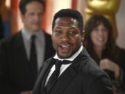 Jonathan Majors arrives at the Oscars on Sunday, March 12, 2023, at the Dolby Theatre in Los Angeles.
