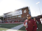 Washington State athletic director Pat Chun watches the first half of an NCAA college football game between Washington State and California, Saturday, Oct. 1, 2022, in Pullman, Wash.