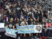 Gonzaga celebrates after the team defeated Saint Mary's in an NCAA college basketball game in the finals of the West Coast Conference men's tournament Tuesday, March 7, 2023, in Las Vegas.