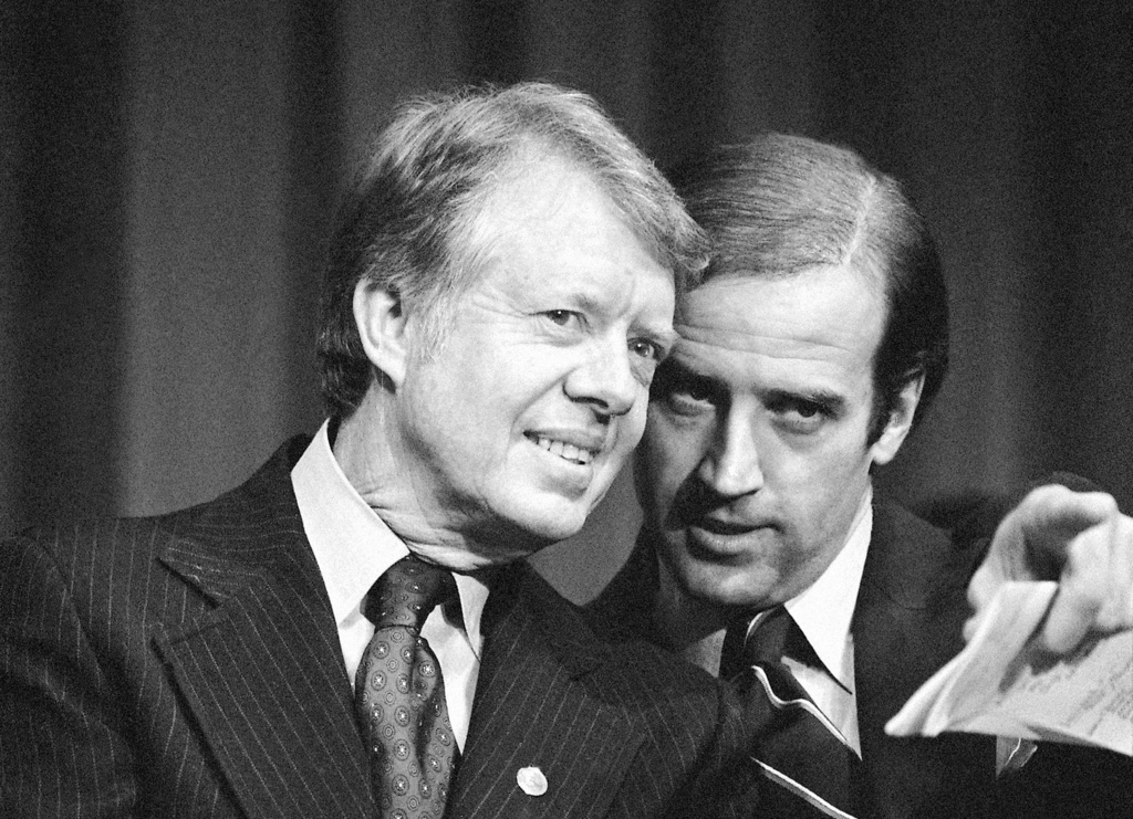 FILE - In this Feb. 20, 1978, file photo, President Jimmy Carter listens to Sen. Joseph R. Biden, D-Del., as they wait to speak at fund raising reception at Padua Academy in Wilmington, Del. President Joe Biden says he plans to deliver the eulogy at the funeral of former President Jimmy Carter, who remains under hospice care at his home in south Georgia.