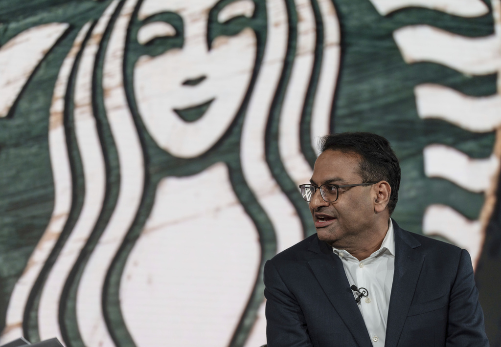 FILE - Incoming CEO Laxman Narasimhan speaks during Starbucks Investor Day 2022, Sept. 13, 2022, in Seattle. Starbucks officially has a new CEO. The Seattle coffee giant said Monday, March 20, 2023 that Laxman Narasimhan has assumed the role of CEO and joined the company’s board of directors.