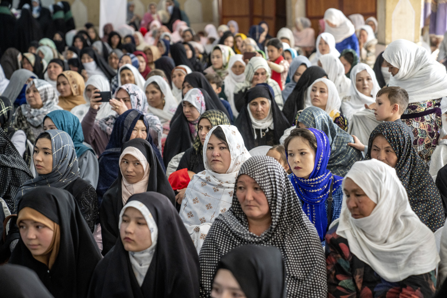 Afghan women attend a mass wedding ceremony during the International Women's Day, in Kabul, Afghanistan, Wednesday, March 8, 2023.