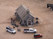 FILE - This aerial photo shows the movie set of "Rust" at Bonanza Creek Ranch in Santa Fe, N.M., on Saturday, Oct. 23, 2021. A judge is scheduled to resolve a weapons-related charge against a codefendant in the case against Alec Baldwin in the fatal shooting of a cinematographer during a 2021 movie rehearsal. Prosecutors have proposed plea agreement with safety coordinator and assistant director David Halls regarding his involvement in the western movie "Rust" and the death of cinematographer Halyna Hutchins. (AP Photo/Jae C.