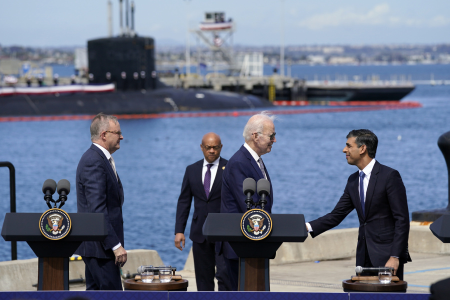 British Prime Minister Rishi Sunak shakes hands with President Joe Biden after a news conference with Australian Prime Minister Anthony Albanese at Naval Base Point Loma, Monday, March 13, 2023, in San Diego, as they unveil, AUKUS, a trilateral security pact between Australia, Britain, and the United States.
