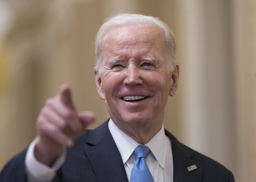 FILE - President Joe Biden talks to reporters after a lunch with Senate Democrats on his upcoming budget and political agenda, at the Capitol in Washington, Thursday, March 2, 2023. (AP Photo/J.